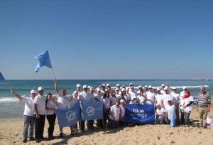 Hilton-Blue-Energy-Team-Cleaning-the-Shore-300x204.jpg