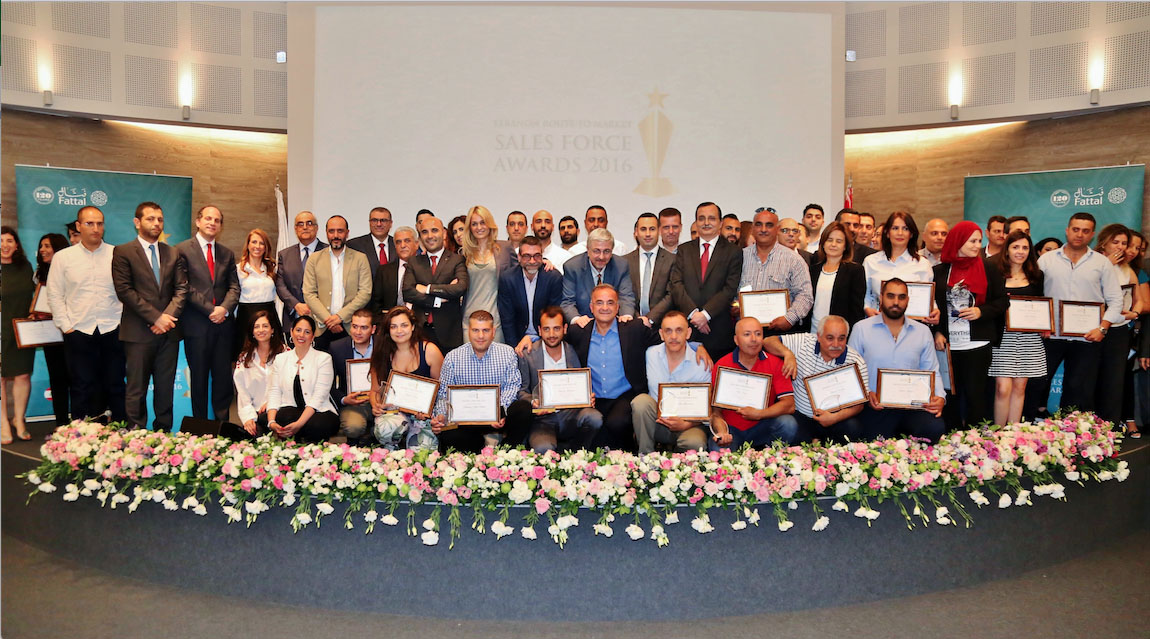 The-Lebanon-sales-team-posing-after-an-awards-ceremony-at-the-Bernard-Fattal-auditorium.-copy.jpg